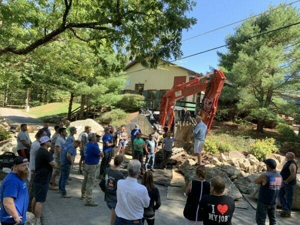 Garden State Koi crew and visiting contractors at a pond build training day