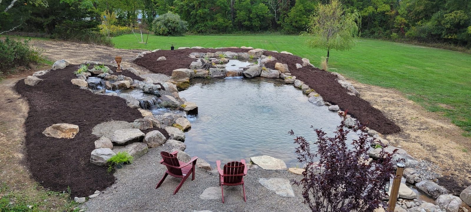 Natural pond with a constructed wetland filter working with mother nature