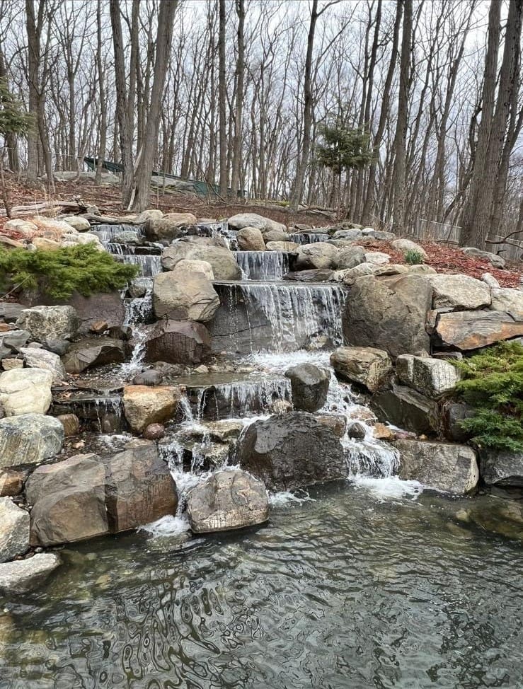 Pond with sparkling water after a full professional cleanout